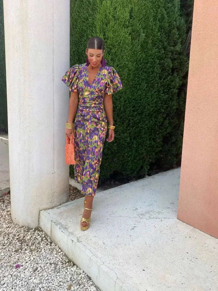 Full-length back view of the Suzette women's evening dress in lilac at a formal event setting