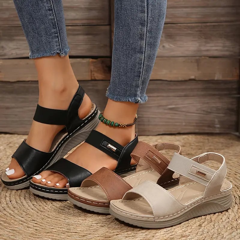 Swift women's adjustable sandals in beige showing strap adjustment detail and breathable construction