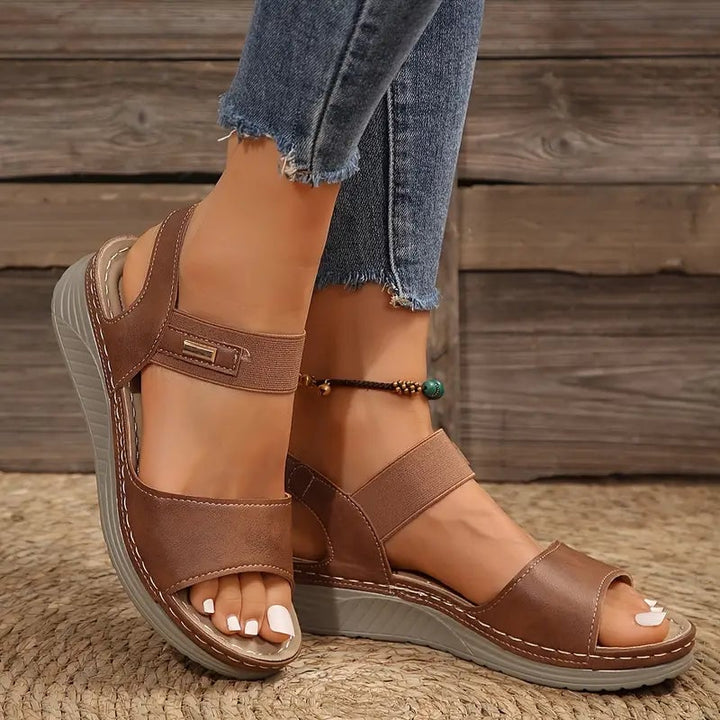 Swift women's adjustable sandals in all three colors — brown, black, and beige — arranged together