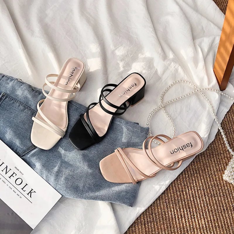 Close-up of Swift sandal strap detail in pink showing feminine silhouette