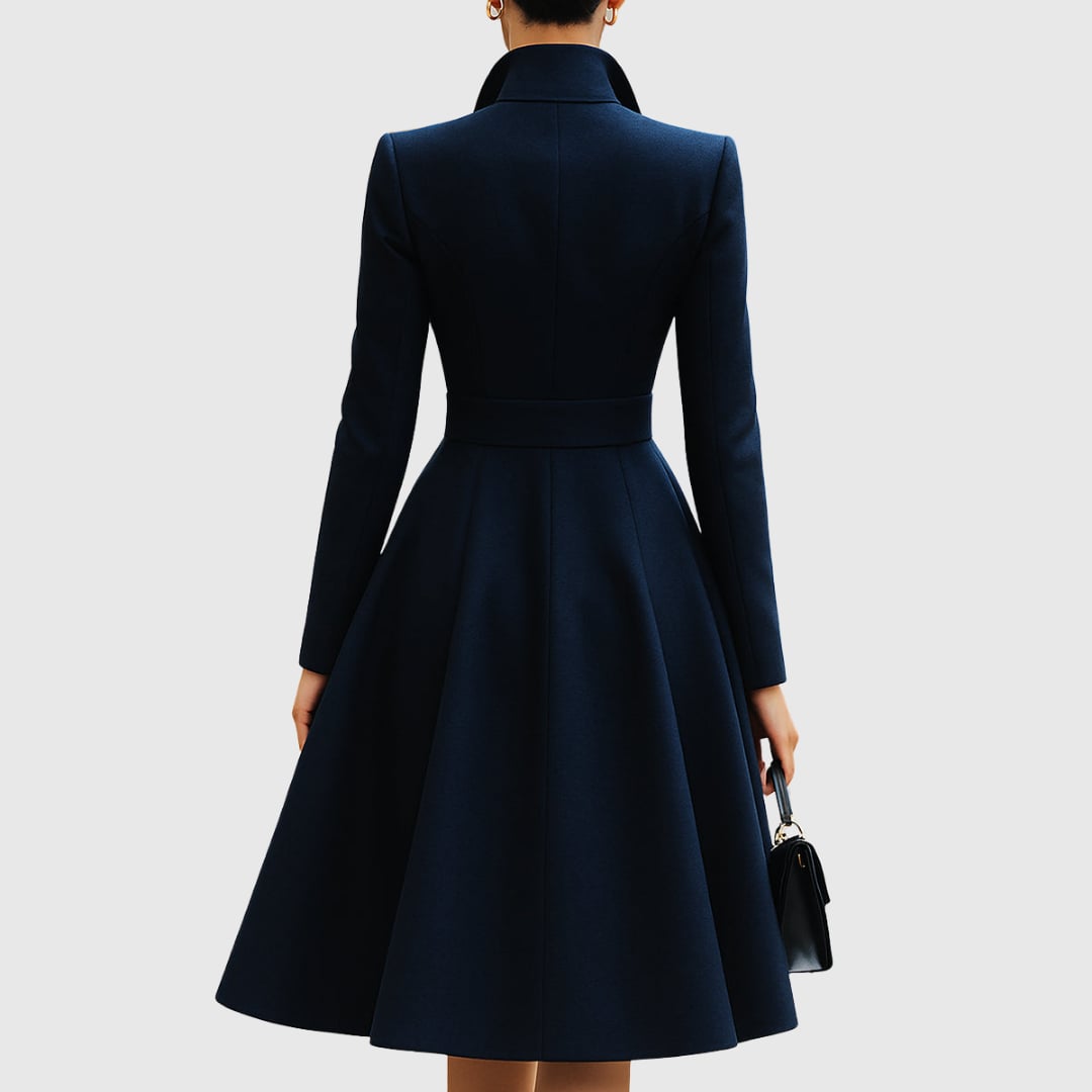 Close-up detail of the Talia navy blue coat dress highlighting clean tailored lines and smooth fabric finish