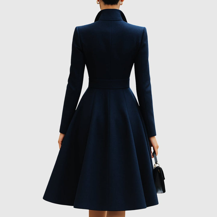 Close-up detail of the Talia navy blue coat dress highlighting clean tailored lines and smooth fabric finish