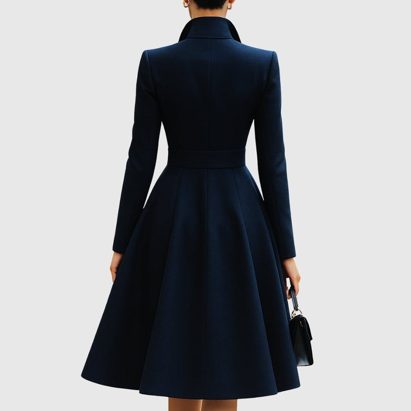 Close-up detail of the Talia navy blue coat dress highlighting clean tailored lines and smooth fabric finish