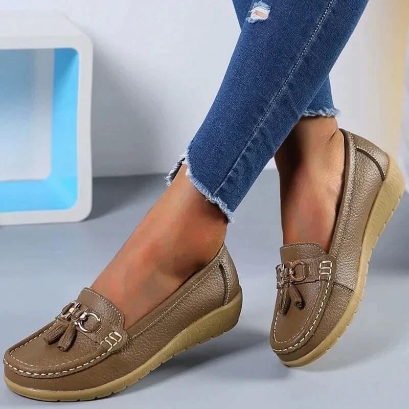 Talia loafers in dark blue displayed at a three-quarter angle on a clean background