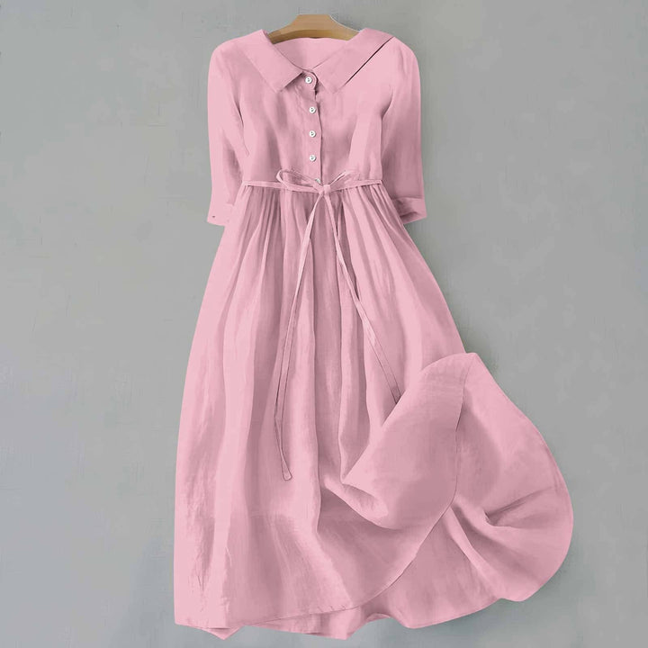 Model wearing the Tammie casual dress in pink demonstrating the flattering relaxed fit