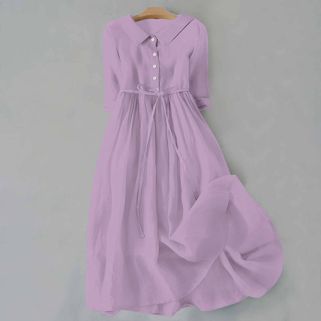 Woman in the Tammie casual dress in purple styled casually for a weekend outing