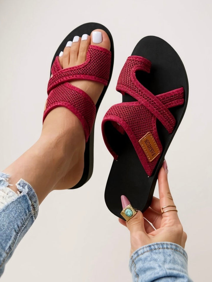 Tamsin women's slides in black worn on foot, showcasing lightweight fit and casual everyday style