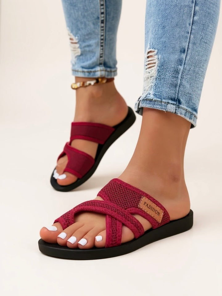 Close-up of Tamsin slide footbed in brown colorway, highlighting cushioned insole and sole construction