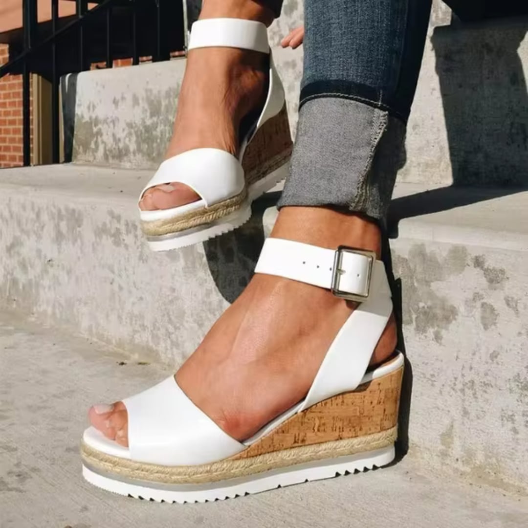 Tamsin women's wedge sandals in white with delicate straps and a supportive wedge heel, front view
