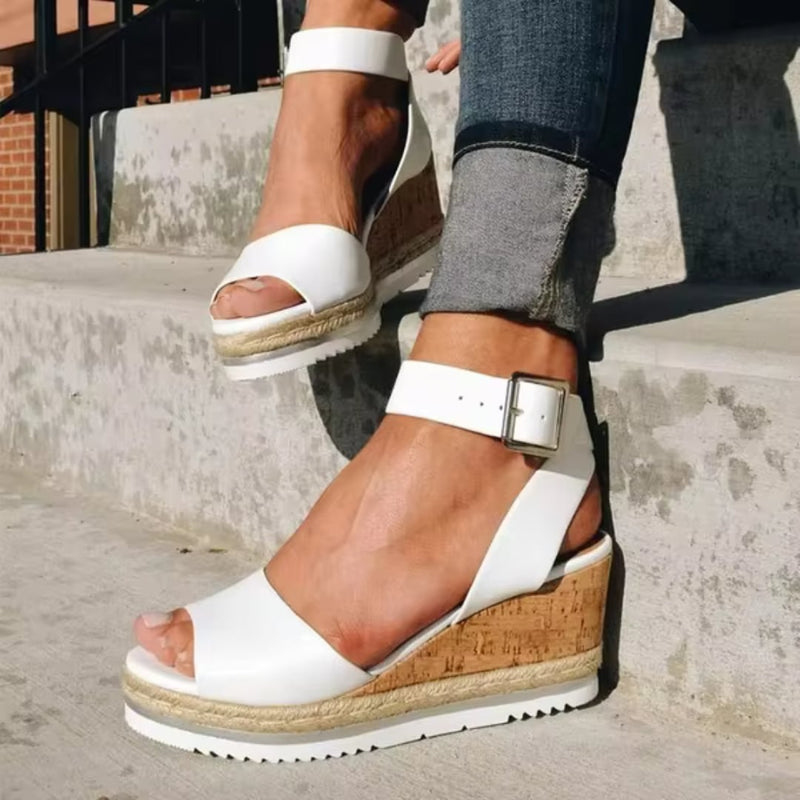 Tamsin women's wedge sandals in white with delicate straps and a supportive wedge heel, front view