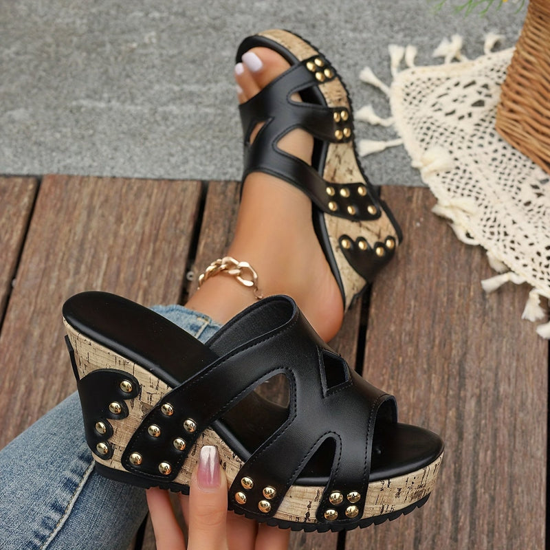 Tansy women's studded wedge sandals in black, side profile view