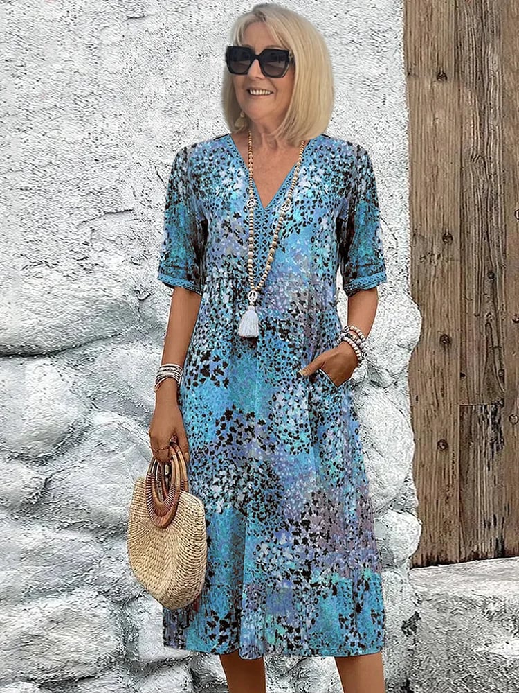 Front view of the Tanya midi dress showing the eye-catching colorful print and relaxed fit