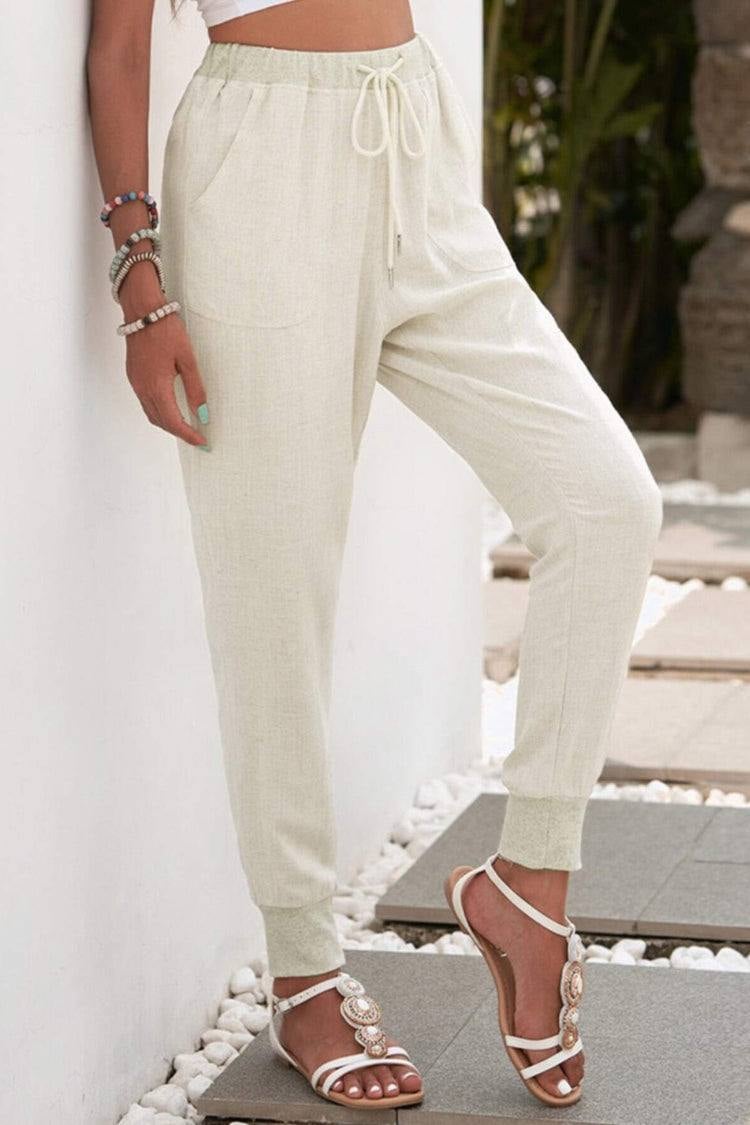 Women modeling Tara jogger pants styled with sneakers for a casual everyday look