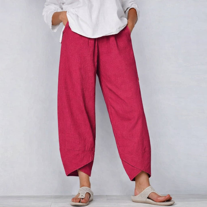 Full-length view of women's tailored summer pants highlighting the relaxed waistband and tapered leg