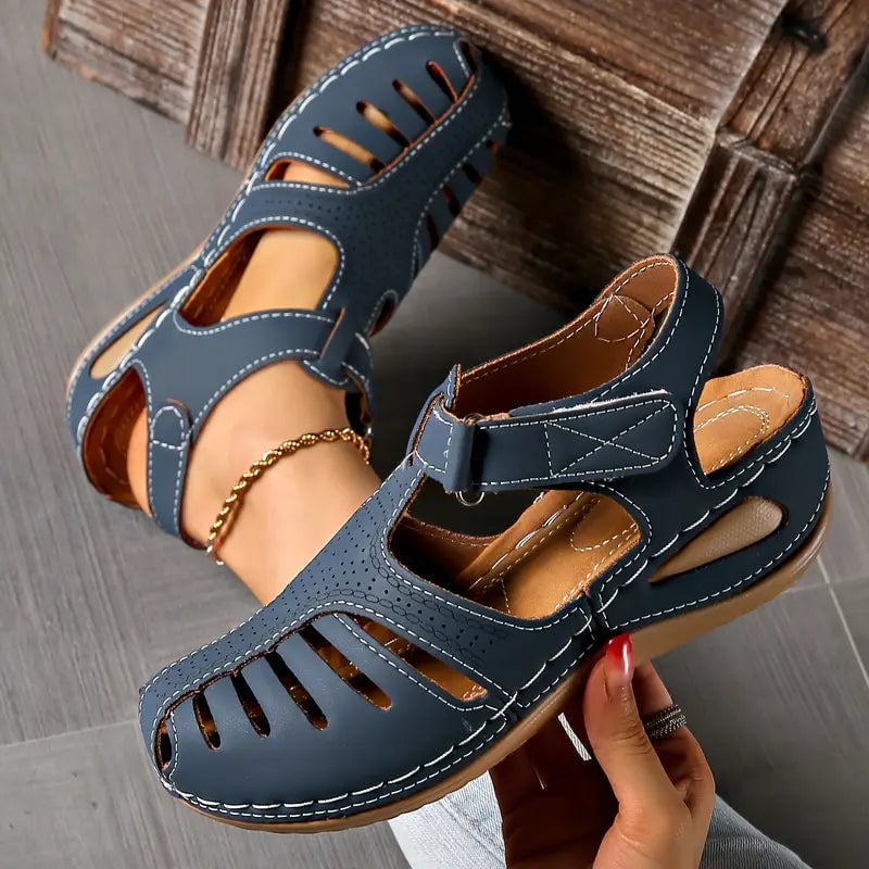 Tatum women's sandals in black showing minimalist strap design on a clean background