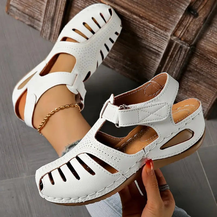 Tatum women's sandals in blue styled with a casual summer outfit, front view