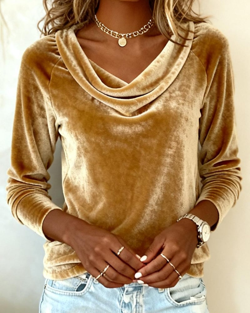 Red velvet drape-neck top on model styled for a going-out look