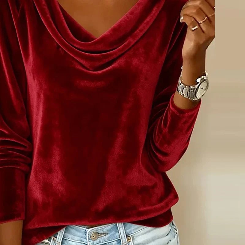 Group flat-lay of the velvet drape-neck top in all six colors: gold, blue, black, pink, green, and red