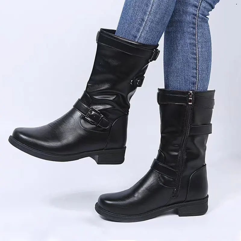 Women's supportive orthopedic ankle boots in black with cushioned insole and sleek contoured silhouette