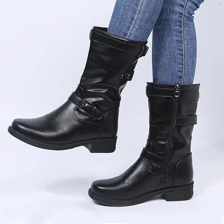 Women's supportive orthopedic ankle boots in black with cushioned insole and sleek contoured silhouette