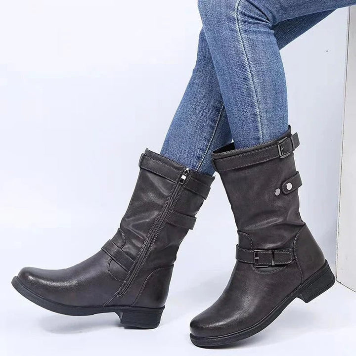 Close-up of orthopedic ankle boot sole showing shock-absorbing construction and arch support design