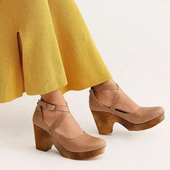 Teresa wedge heels pair laid flat showing all four color options: black, brown, green, khaki