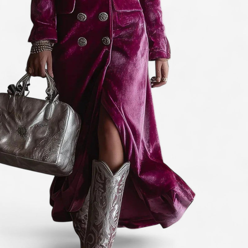 Close-up detail of the magenta midi dress fabric showing its soft, lightweight texture and smooth finish