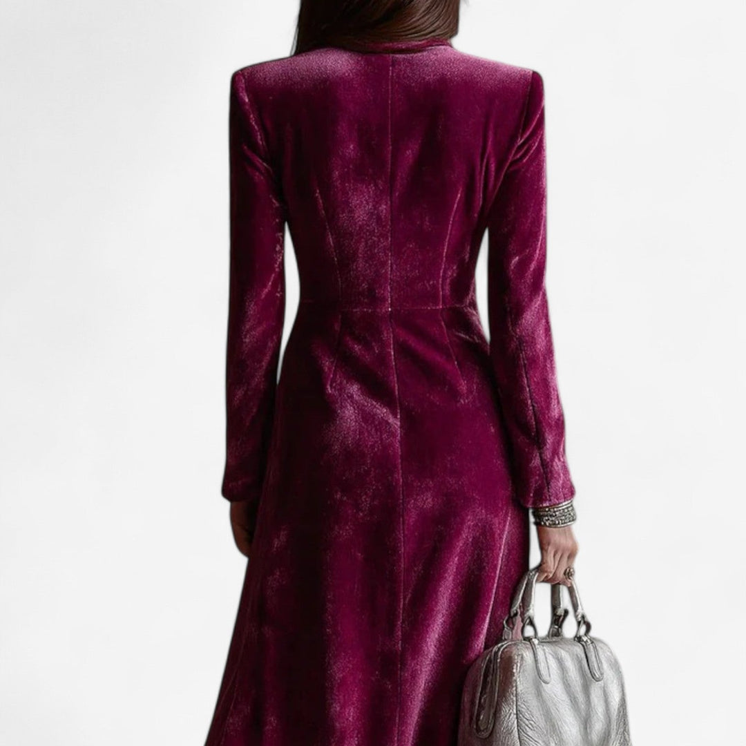Woman styling the magenta midi dress with heels, showcasing its graceful midi length and polished look