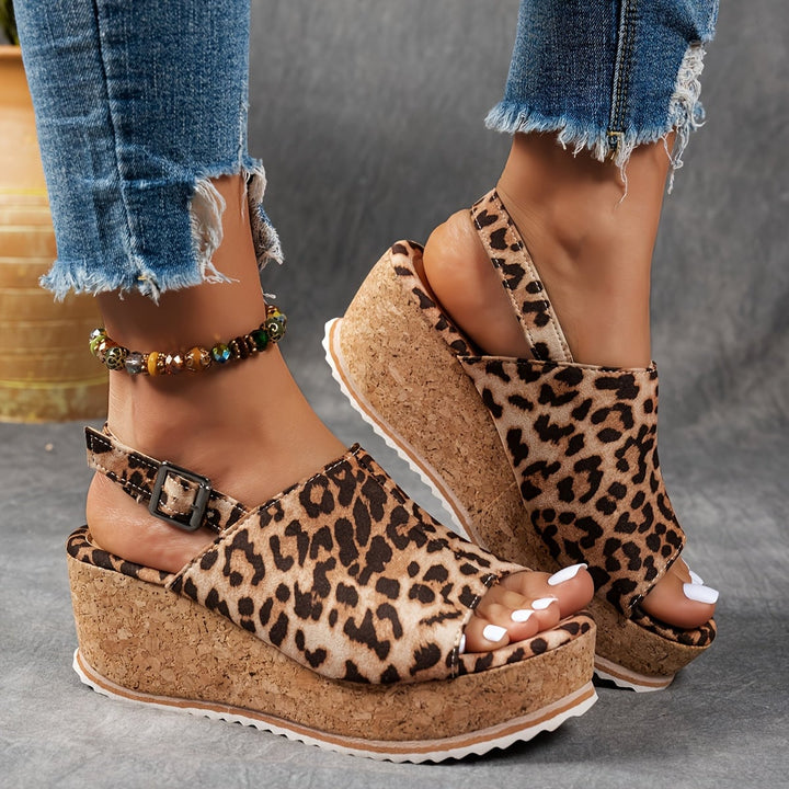 Terra platform sandals in brown leopard print shown from the side showcasing platform lift