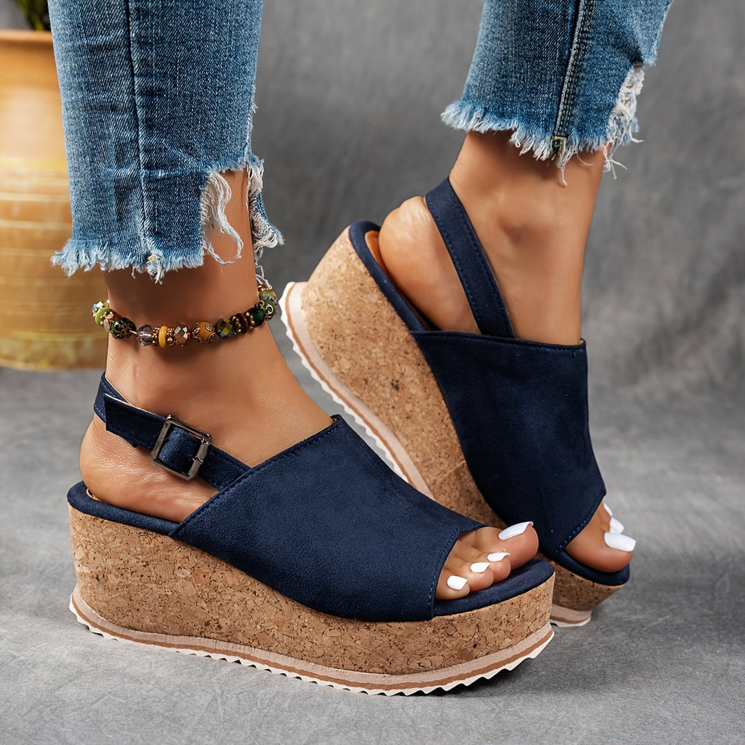 Terra platform sandals in brown leopard print flat lay on neutral background
