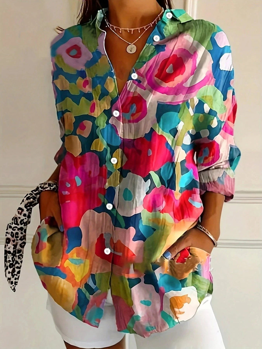 Side view of a soft drapey printed blouse showing relaxed silhouette