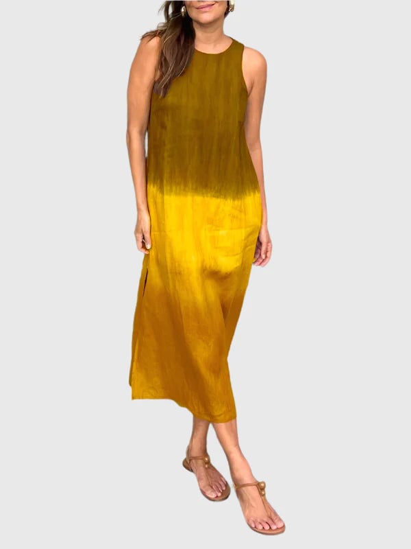 Back view of the Terri-Lynn print dress showing full length and flowing silhouette
