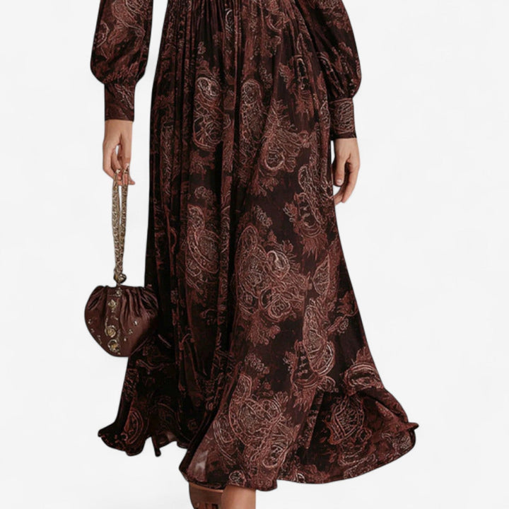 Full-length view of a brown maxi dress with a natural, slimming silhouette perfect for everyday or special occasions