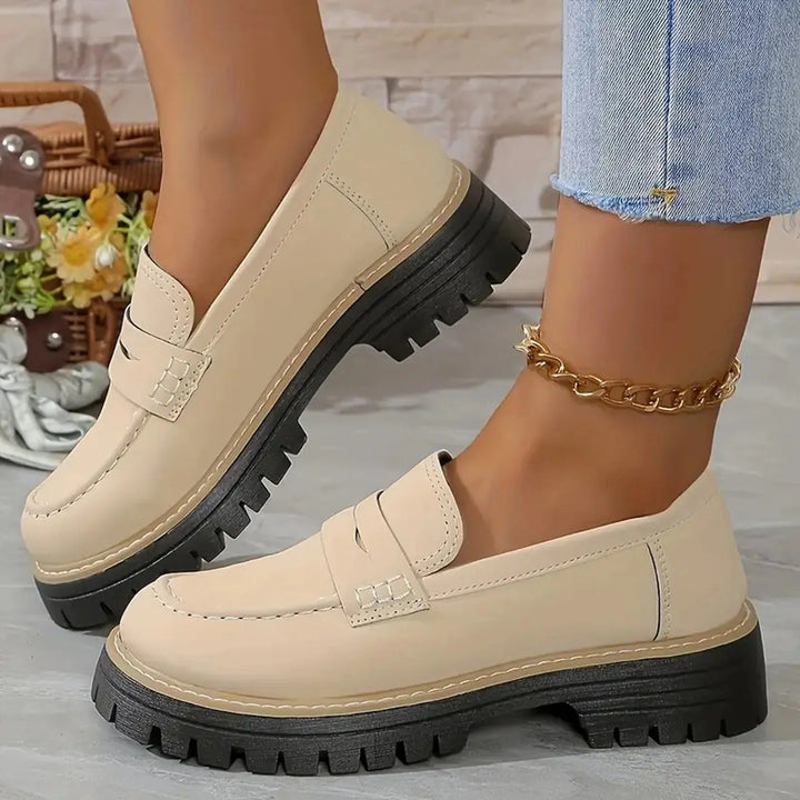 Thalia chunky platform loafers in beige with thick lug sole and round toe, side view