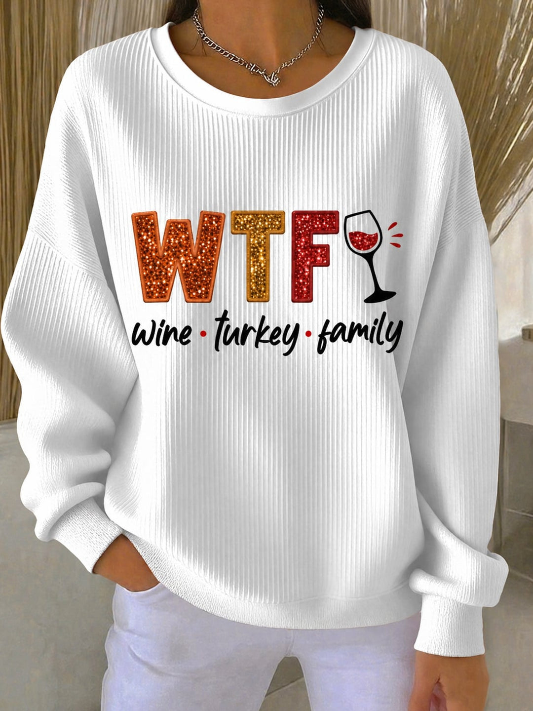 Front view of the Thanksgiving Spirit Sweatshirt in white with a cozy relaxed fit and holiday graphic design