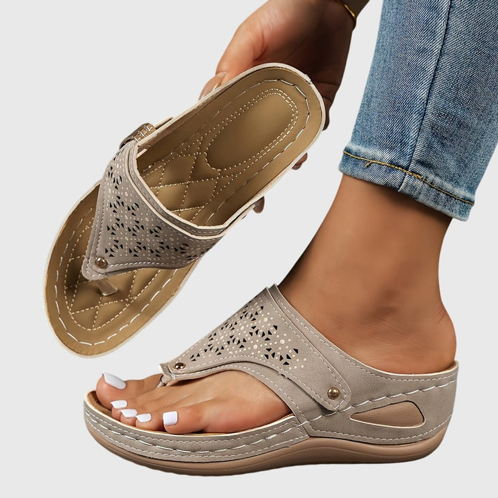 Women's platform ankle strap sandals in brown, front view on white background
