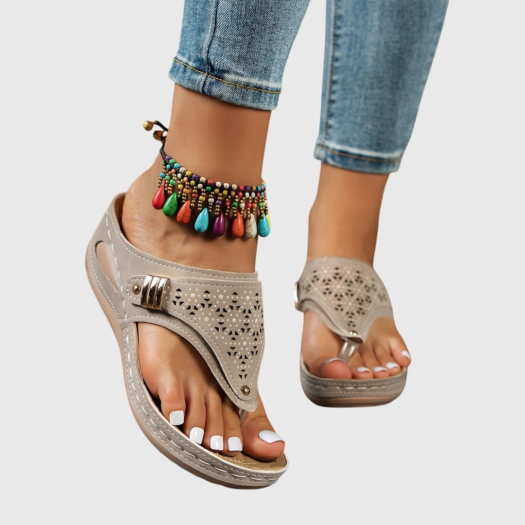 Women's platform ankle strap sandals in brown, side profile view