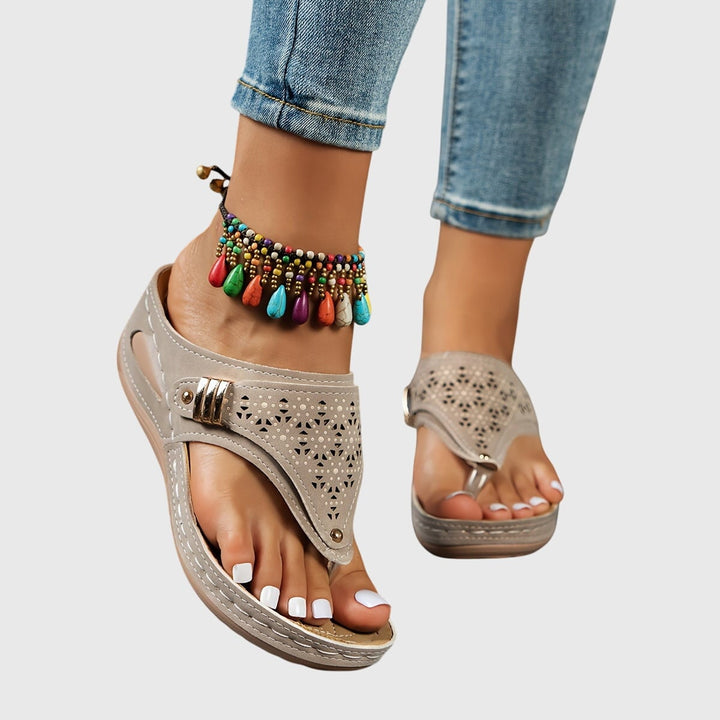 Women's platform ankle strap sandals in brown, side profile view