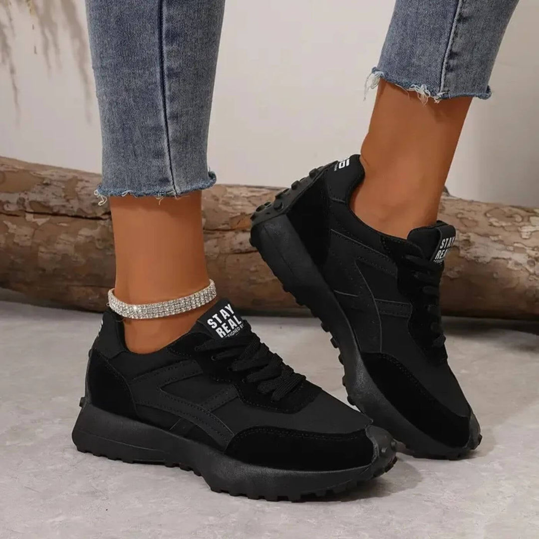 Side profile of orthopedic sneakers highlighting lightweight flexible construction and anti-slip outsole