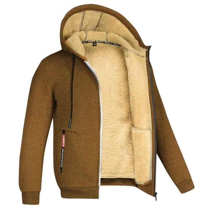 Back view of the ThermaCore Insulated Jacket in dark grey highlighting the relaxed cut