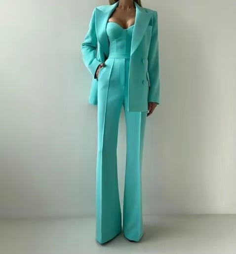 Women's three-piece blazer set with corset top and high-waist flare pants in bold green, front view