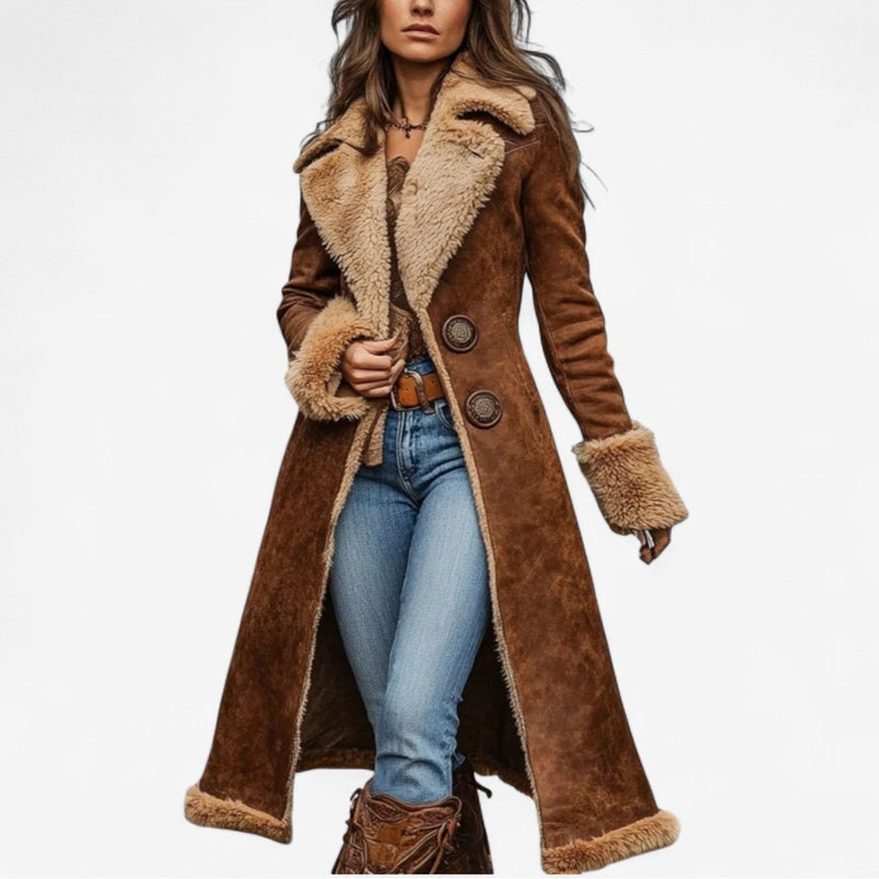 Woman wearing a brown timeless soft coat with a relaxed tailored silhouette, shown from the front