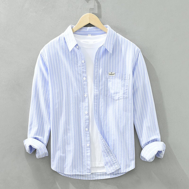 Front view of a striped casual shirt in a relaxed fit with vertical stripe pattern