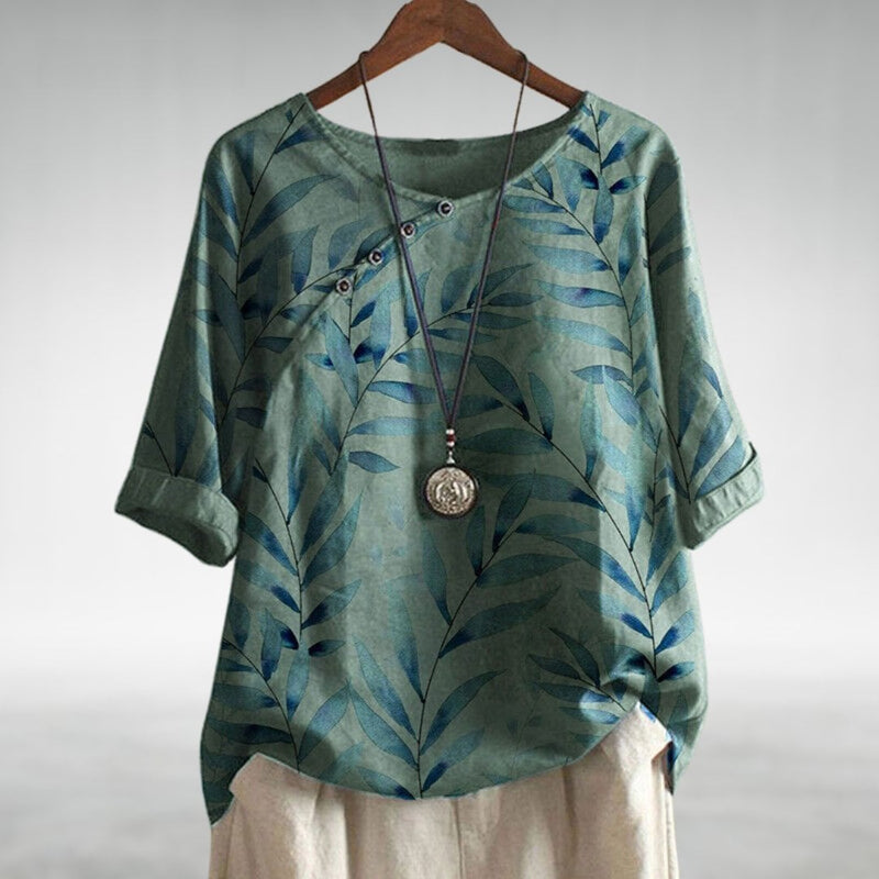 Florimay chic blouse in a flowing relaxed fit shown from the front, highlighting the unique button closure