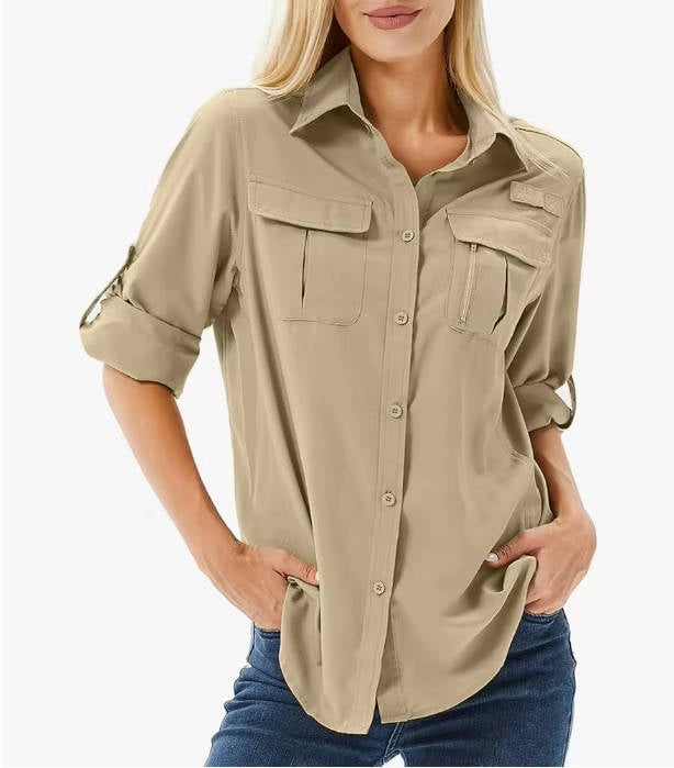 Close-up of the dual chest pockets on a mud yellow women's outdoor hiking shirt