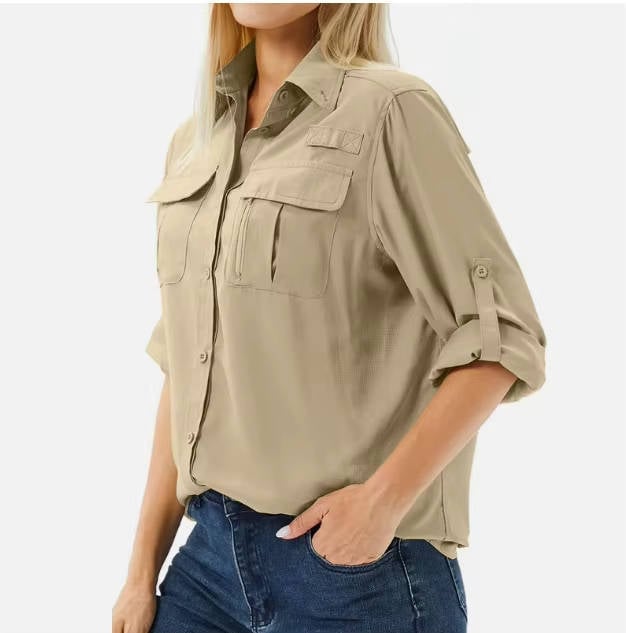 Flat lay of the women's UPF 50 hiking safari shirt in multiple colors including pink, black, and sky blue