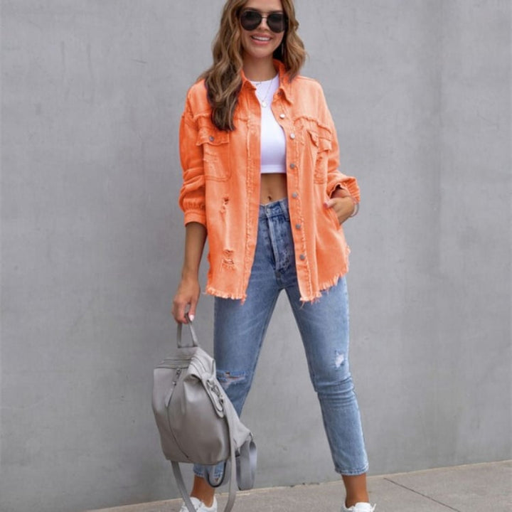 Side view of a relaxed-fit distressed jacket in orange with button-down front