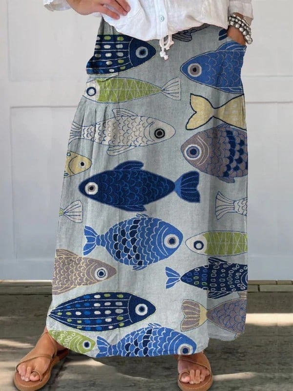 Blue vintage fish art print A-line pocket skirt with elastic waistband, shown in full length front view