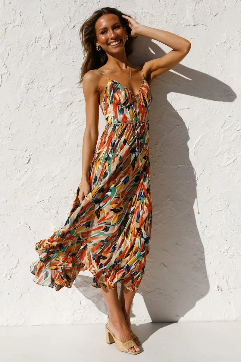 Model wearing the TropicLush Elegant Dress in green, showing full-length silhouette