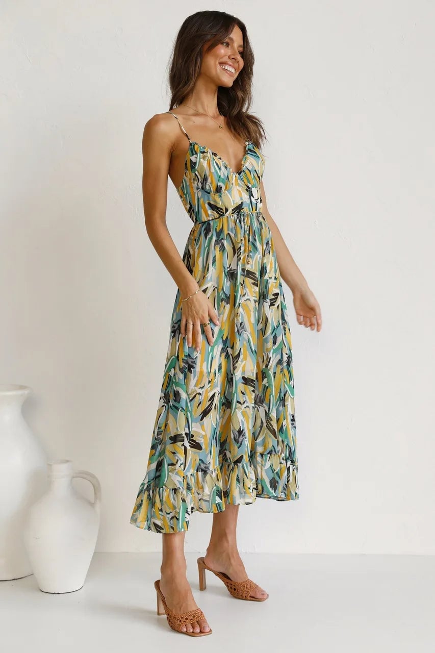 Detail shot of the TropicLush Elegant Dress neckline and fabric texture